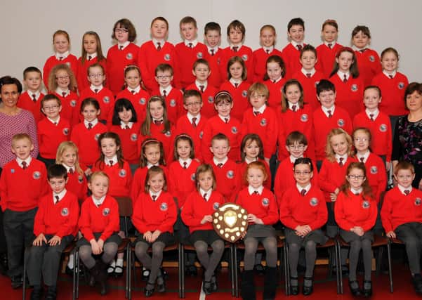 The Orritor Primary School Junior Choir who were winners of the McCord Family Shield at the Dungannon Music & Drama Festival. Included in the picture are teachers Mrs. Currie and Miss Bates.mm1310-134ar.