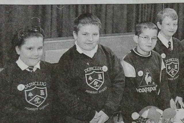 Dunclug Primary School pupils who raised money for the Premature Baby Appeal by holding a 'Blue Peter' Bring and Buy Sale.
2000