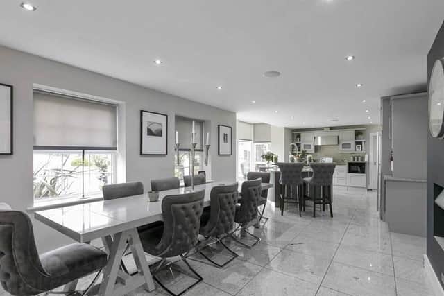 The property includes an open plan kitchen, living, dining area with luxury contemporary fitted kitchen