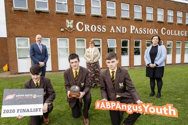 Cross & Passion College Ballycastle are also through to the final stage. Pictured is the team representing the school, Conor John McGarry, DJ McAlister and Aidan Hamilton with back row from left: School principal Paul McClean with teachers Sharon Walker and Martina Devlin