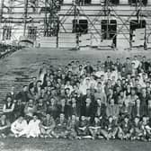 Some of those involved in the construction of Parliament Buildings at Stormont, Belfast. Does anyone recognise anyone in this old photo? Did anyone in your family help build Stormont? Get in touch, email: darryl.armitage@jpimedia.co.uk. Picture: News Letter archives