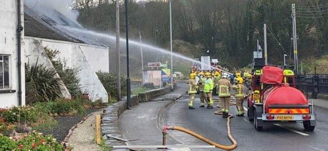 Firefighters deal with the blaze in Glenarm