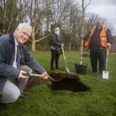 LCCC’s Chair of the Leisure & Community Development Committee, Alderman Michael Henderson MBE, with Trish and Thomas, members of Hilden Community Association.