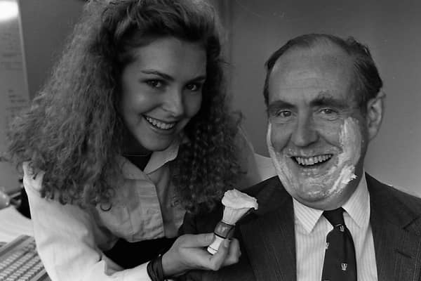 Only a hard-pressed Secretary of State for Northern Ireland would start his day without having a shave but Tracy Wilson was on hand to soft soap his bristles when he visited the beauty-without-cruelty form Nectar Cosmetics in Carrickfergus in October 1989. Picture: Trevor Dickson/News Letter archives