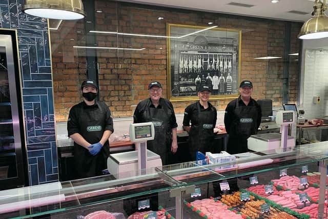 Staff at the newly expanded butchery counter in Greens Food Fare