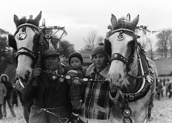 Pictured at a ploughing match in November 1980 are Robert Boyle, his son Alan and Robert's grandson Sam and they are from Ballycarry, Co Antrim. Many thanks to Robert's grand-daughter Amanda for helping put names to this brilliant photograph. Picture: News Letter/Farming Life archives