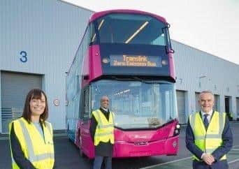 Infrastructure Minister, Nichola Mallon, with Wrightbus CEO Buta Atwal and Translink Group Chief Executive Chris Conway