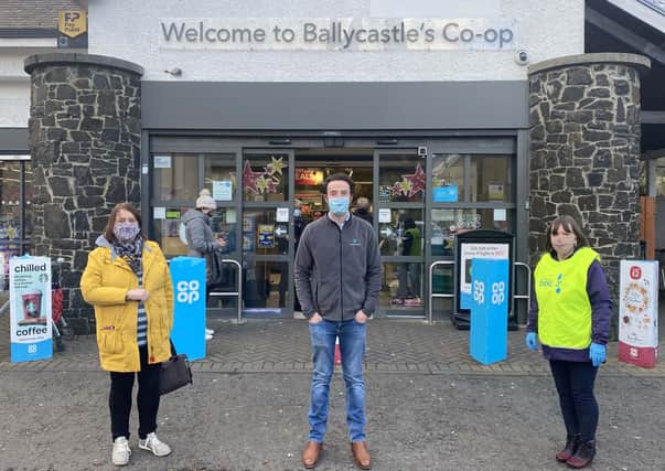 Steven McAuley, Member Pioneer for Ballycastle and Bushmills Co-op, welcomes two local store causes, Kate Elliot from Goodmorning Ballycastle and Eleanor Hayes from Ballycastle Foodbank during a collection in store on Saturday