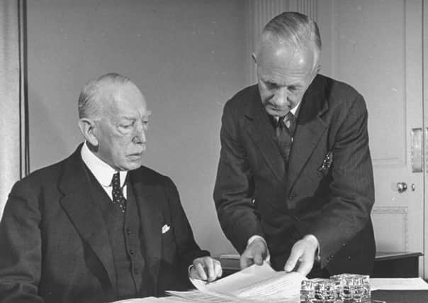 The Prime Minister of Northern Ireland Lord Craigavon speaking with Mr Robert Gransden the Secretary to the Cabinet in 1940
