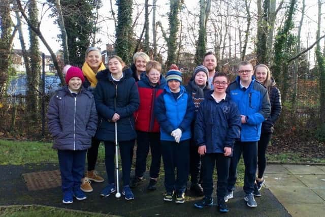 Students from Wallace High, Parkview and Beechlawn were honoured with an Ulster Wildlife Grassroots Challenge Award for their efforts improving their local environment. Pictured are pupils from the Parkview School award winning class and teacher Gillian Pierce, To read more see page 7
