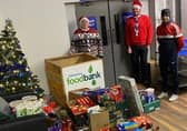 Fifth Ballymena Scouts festive support Foodbank
During these times of restrictions, the Fifth Ballymena Scout Group considered how they could still do their bit for the community this Christmas.
One very deserving charity that they all agreed to help was Ballymena Foodbank. For many reasons this Christmas will be especially challenging for a lot of local families in our community and the Explorers, Scouts, Cubs and Beavers of Fifth Ballymena were only too happy to do their bit and help out. The Group organised a socially distanced driveway food drop off and Leaders were delighted to see how the Christmas spirit was truly alive as the donations came pouring in throughout the day. Will McDonald from the Ballymena Foodbank chatted to them all during a Zoom meeting and explained the items they were especially in need of. Many of the members shopped for these items themselves and some even used their own pocket money. The donations were transported on to Ballymena Foodbank and when weighed by the charity totalled