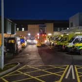 Ambulances at the entrance to the emergency department with a number of the vehicle with patients awaiting to be admitted, at Antrim Area Hospital, Co Antrim in Northern Ireland, as the emergency department and hospital is currently at full capacity. PA Photo. Picture date: Tuesday December 15, 2020. Photo credit should read: Liam McBurney/PA Wire