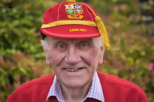 Raymond Hunter with his Lions cap.