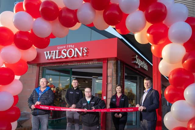 Pictured (l-r) Owners Eamon Wilson and Peter Wilson with staff member Patrick Cullen, owner Emma Wilson, and Nigel Maxwell, SuperValu Sales Director.