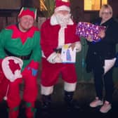 Rath volunteers toured the estate with Santa.