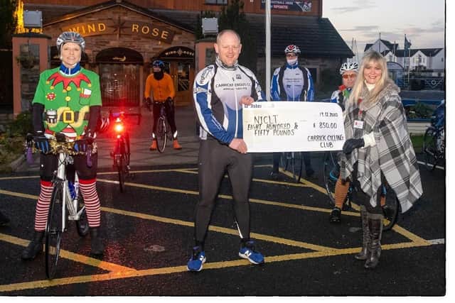 Pictured, from left, are: Diane Olphert, treasurer, NI Children to Lapland Trust, Stephen McCahon, chairman, Carrick Cycling Club and Lynne Rodgers, NICTL trustee.