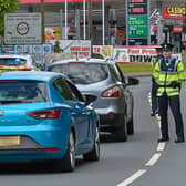 Members of An Garda Síochána operate a vehicle checkpoint on the main Muff to Londonderry border crossing, a regular feature of life in 2020.