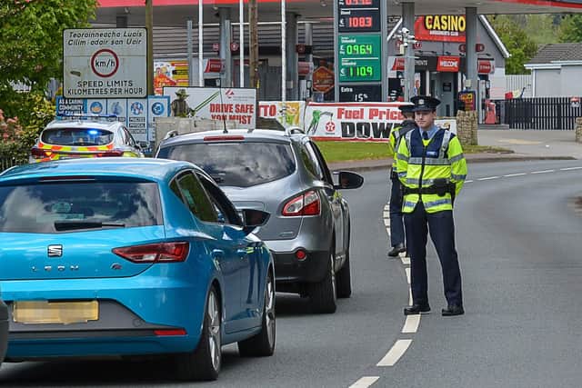 Members of An Garda Síochána operate a vehicle checkpoint on the main Muff to Londonderry border crossing, a regular feature of life in 2020.