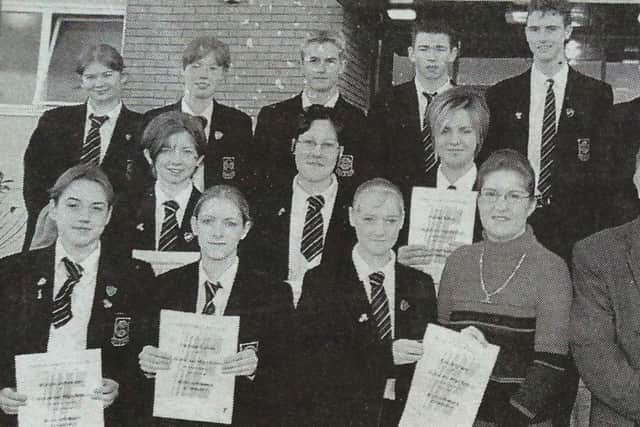 Pupils from Cullybackey High School who completed at course on Microsoft Mail pictured receiving their certifications from Bill Richardson of NIE.
2000