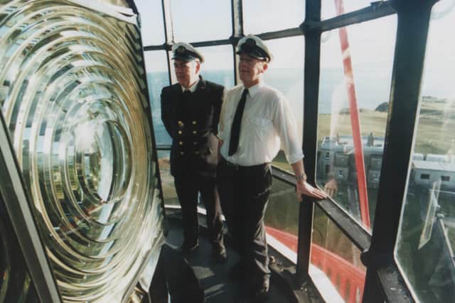 Jim Canning (left) and Gerald McCurdy inspect the huge light in one of Rathlin Island's three lighthouses. The East Light, built in 1856, is the oldest. It became automated in 1995. The Rue Light, at the southern tip opposite fair head, is only 35 feet above sea level. At the western tip of the island is the West Light, built between 1912 and 1916 at the enormous cost in those days of £400,000. All three of the lighthouses stand as monument to its wild coast while over 40 recorded shipwrecks lie in the depths of underwater cliffs and caves. This photograph dates from 1994. Picture: News Letter archives