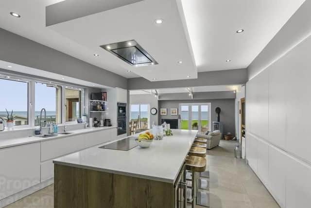 The property has an open plan kitchen, living, dining area with superb contemporary kitchen