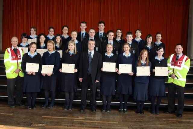 Pupils from St. Louis Grammar School who received their Order of Malta Corps First Aid Certificates pictured with the school's Principal Mr. F. Cassidy, Mr. Declan Martin and Mr. Adrian Quinn. BT14-004JM.
