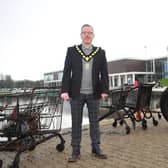Lord Mayor Kevin Savage with some of the rubbish that has been cleared from the Craigavon LakesPiC: www.LiamMcArdle.com