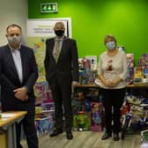 Pictured with the huge collection of toys are Evan Morton and Garry MacDonald from Lisburn Chamber and Roberta Marshall and Eilish Robinson from Barnardos NI.