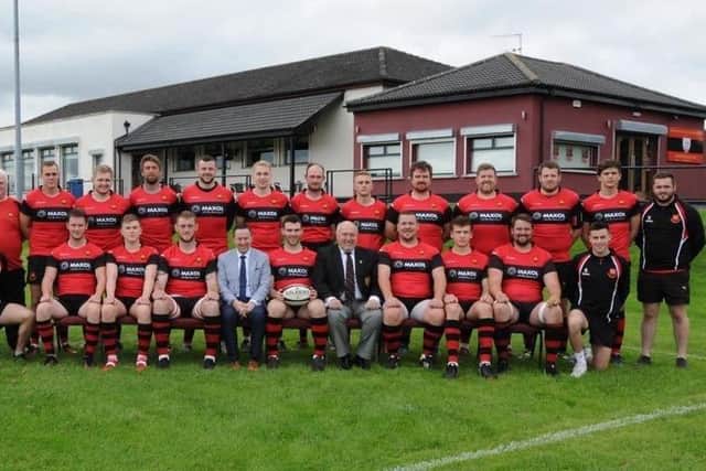 Brian Donaldson, Chief Executive Officer, The Maxol Group (centre) with Carrickfergus First XV.