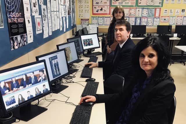 Loreto College Vice Principal Mr Stephen Gallagher and Senior Teacher Mrs Caragh Little put the finishing touches to the new College website, alongside College Principal Miss Belinda Toner