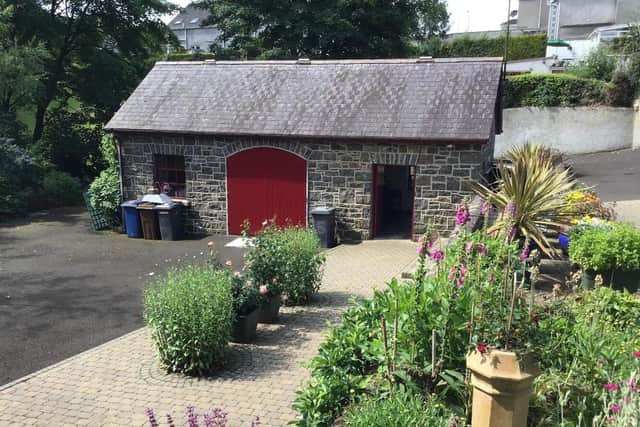 The garage - originally the coach house with pony and tack room  - has been restored and rebuilt