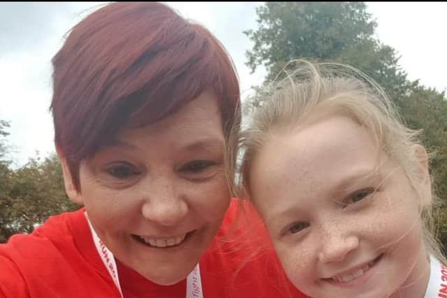 Julie and her daughter Emily support NI Chest Heart and Stroke’s Red Dress Run every year.
