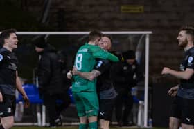 Jude Winchester celebrates with Ballymena United team-mates during Saturday’s victory against Carrick Rangers. Pic by Pacemaker.