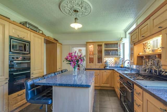 The property has a  well appointed kitchen - with utility room off
