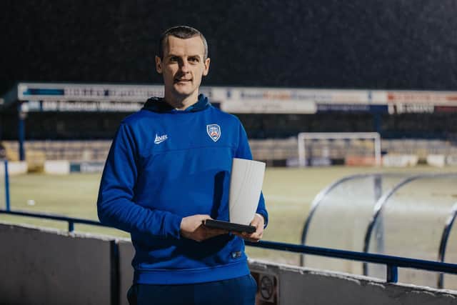 Coleraine manager Oran Kearney receives the award
