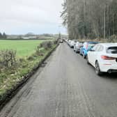 Cars parked outside Iniscarn Forest, Desertmartin, on Sunday.