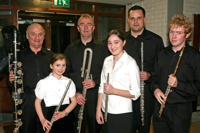 Members of Kellswater Flute Band show the different range of flutes used during the 60th Anniversary gala concert, held last week in Ballee High School. BT49-230AC