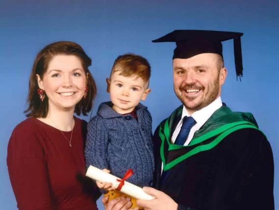 Chris McConnaghie, winner of the Dayle Smyth Endeavour Award, who was awarded a Foundation Degree in Electrical and Electronic Engineering with Distinction at Northern Regional College’s annual Higher Education graduation ceremony, pictured with his wife Holly and son Henry