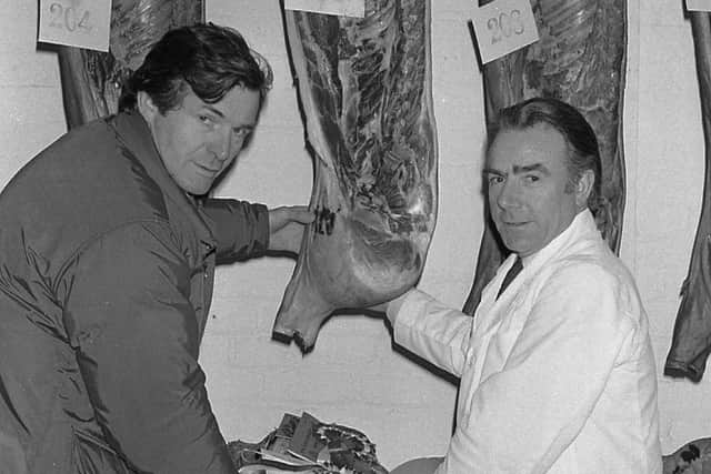 Mr Robert Overend from Bellaghy, Co Londonderry, is pictured with his champion bacon carcase on which he is congratulated by Mr John Wilson, deputy chief livestock officer, in February 1982. Picture: Farming Life archives