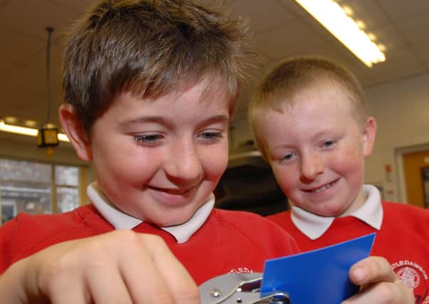 Tyler and Jordan, from Castledawson PS busy making keyrings during the Primary Activity Day at Maghera High School.mm4907-103ar.