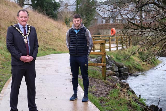 Chair of the Council, Councillor Cathal Mallaghan is pictured with Damian McCaul, Donaghmore and District Development Association at the Donaghmore Riverside Walk, one of the 6 locations in the district to benefit from the £700K EU Peace IV-funded ‘Shared Space’ project.