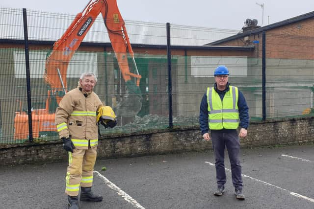 Watch Commander Tommy Torbitt from Northern Ireland Fire and Rescue Service and Seamus Woulahan of Seaview Developments outside Larne Fire Station which is currently being refurbished.