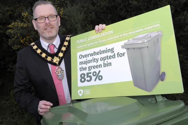 Lord Mayor, Cllr Kevin Savage with the results of the bin consultation. ©Edward Byrne Photography