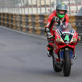 A visibly upset Glenn Irwin tours into pit lane at the 2017 Macau Grand Prix following a fatal accident that claimed the life of English rider Dan Hegarty.