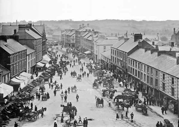 A bird's eye view of a bustling Market Street, Portadown, Co Armagh. Date: ca. 1900. NLI Ref: EAS_0117. Picture: National Library of Ireland