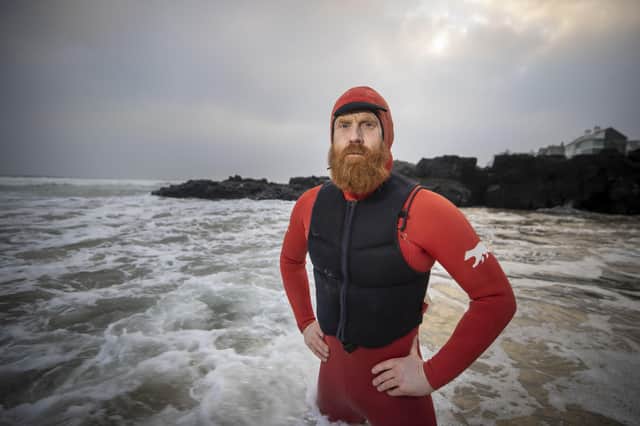 Al Mennie has raised over £15,000 by swimming in complete darkness over two months