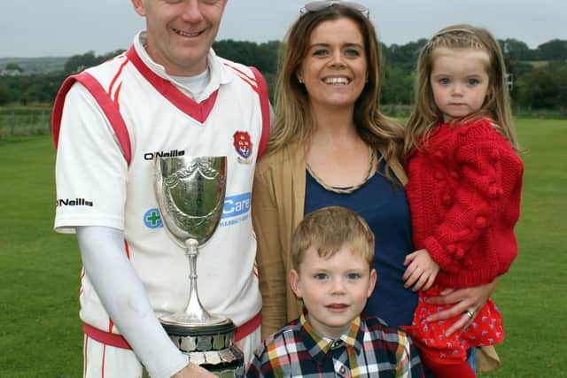 Peter Gillespie enjoys the Premier League title win of 2014 with his wife Ciara and kids, Abaigh and Ruairi. Picture courtesy Barry Chambers