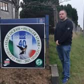 Pomeroy community representative Ian Irwin pictured beside the poster in Pomeroy.