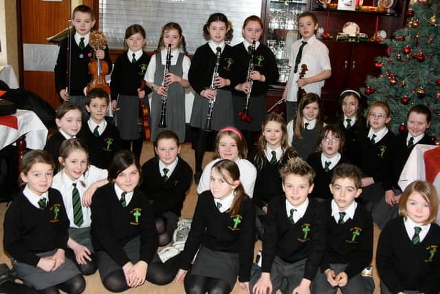 Pupils from All Saints Primary School who entertained staff and residents of Pinewood Residential Home. BT52-022JM.