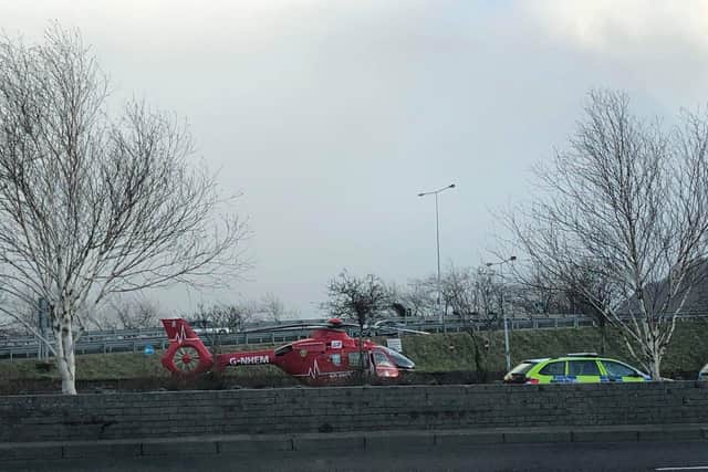 The air ambulance landed close to the 'Crown' roundabout.